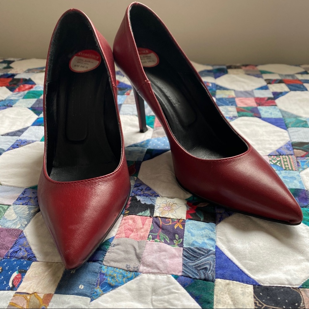 Deep red leather pumps